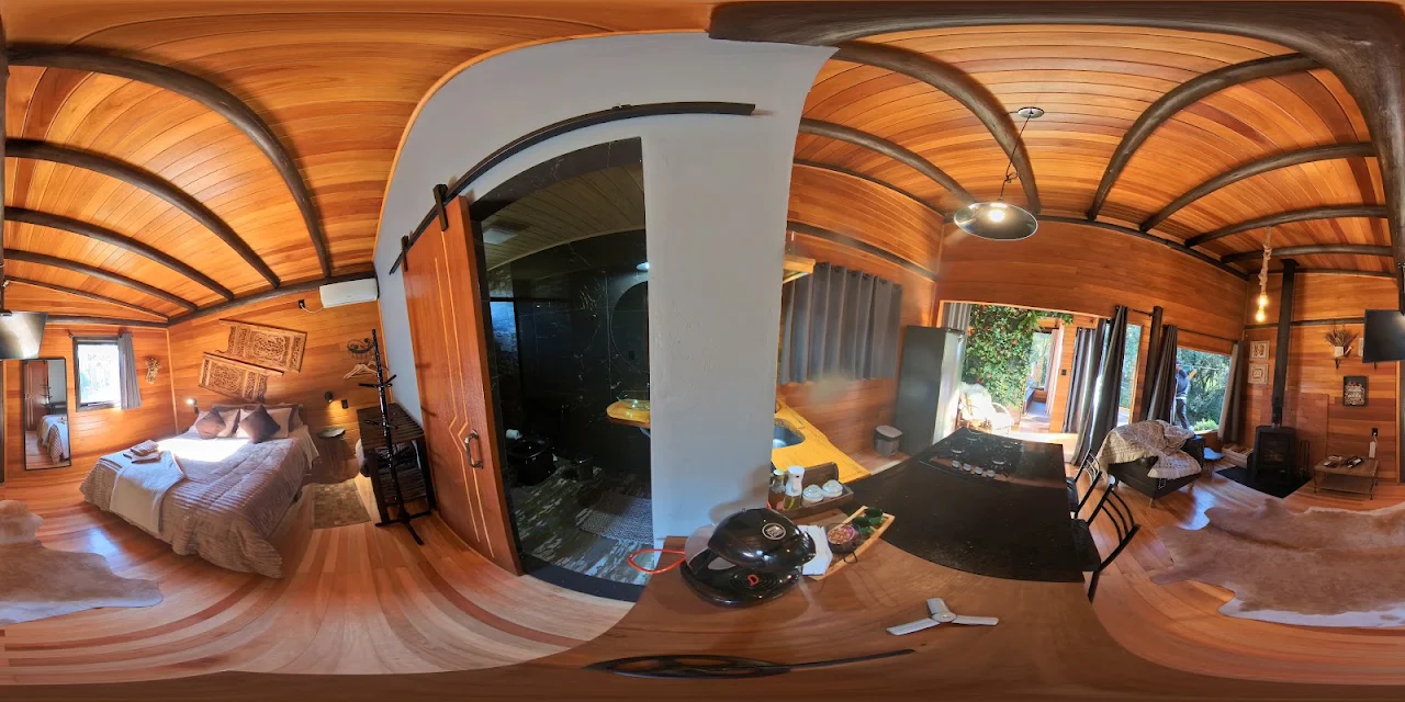 Vista panorâmica 360 graus do quarto, banheiro, cozinha e estar da Cabana do Rio